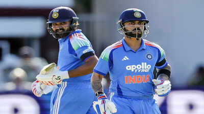 london england jul 19 ani india39s rohit sharma and virat kohli run between
