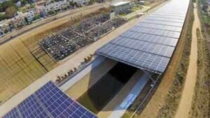 a half mile solar strip floats above an irrigation canal in gujarat generating 16 million kilowatt h