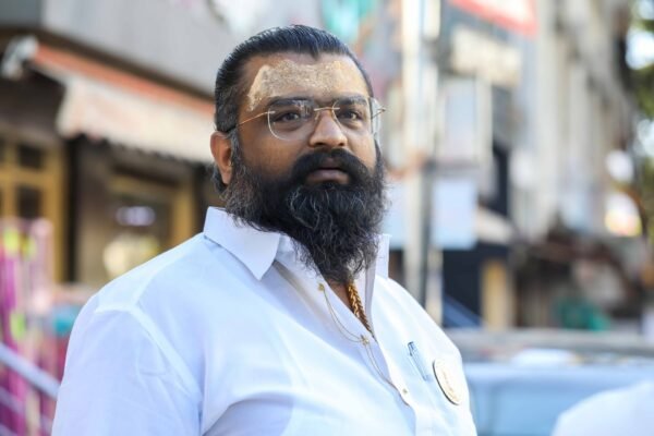 dmk criticizes vijays uk visit amidst motorsport event