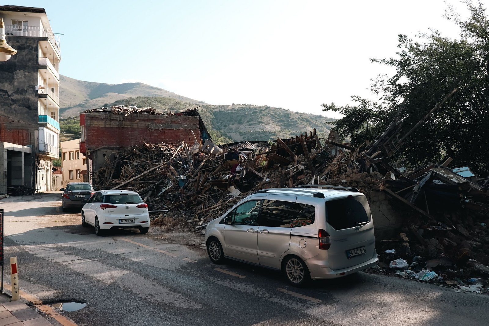 tragic building explosion near acropolis claims six lives