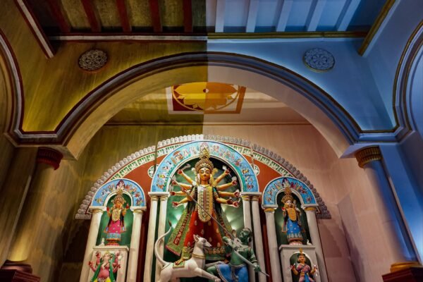 assams durga puja pandal reflects on flood impacts and tea heritage