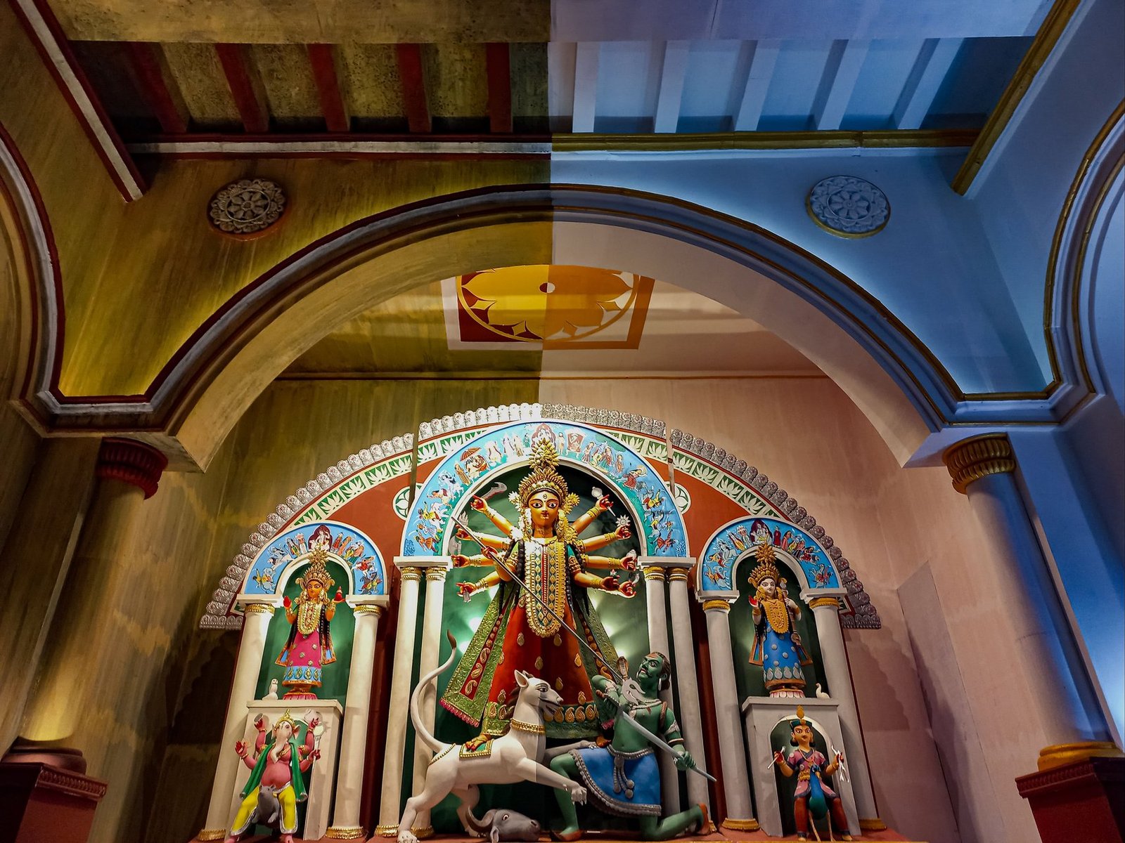 assams durga puja pandal reflects on flood impacts and tea heritage